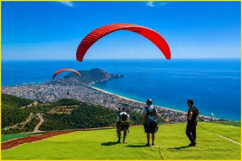 تجربة الطيران المزدوج بالمظلة الجانبية | رحلة فوق شاطئ كليوباترا